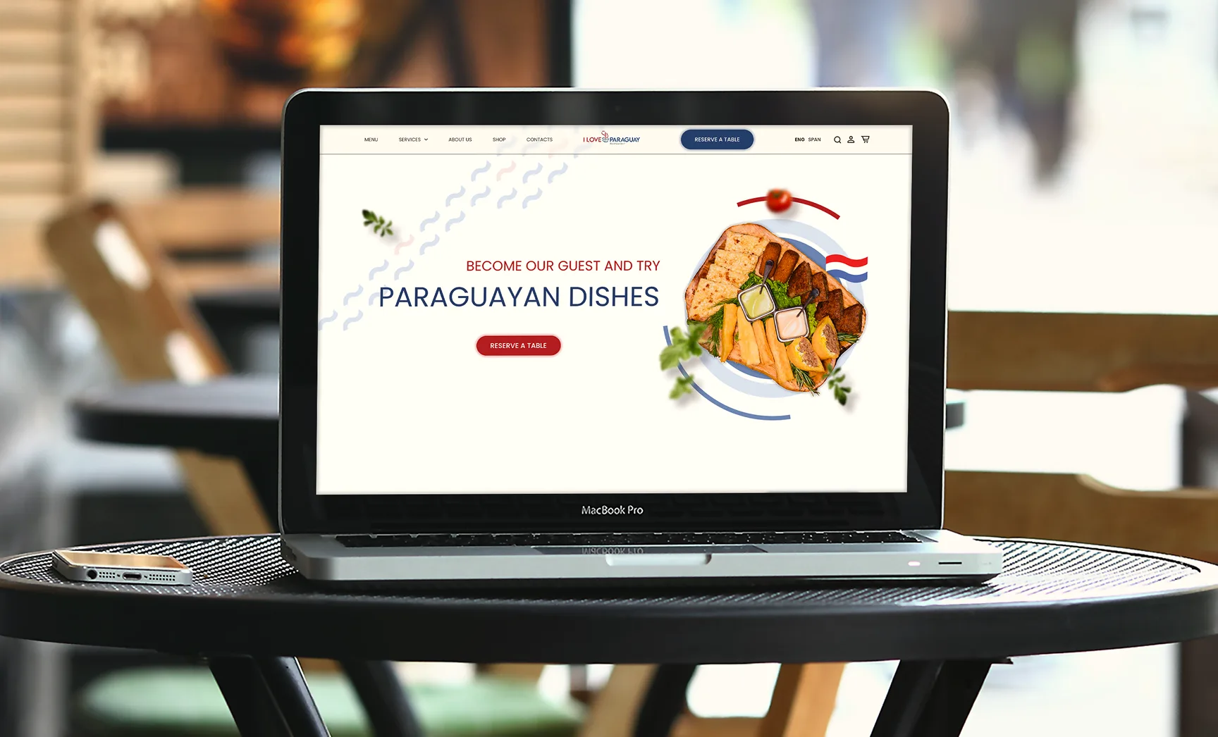Paraguayan food website displayed on a laptop mockup